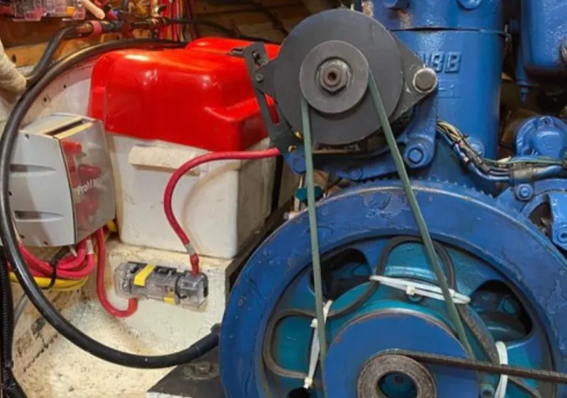 Slide: The Image of 1982 Bristol Channel Cutter 28 galley with sink, stove, and wooden cabinetry. - 9
