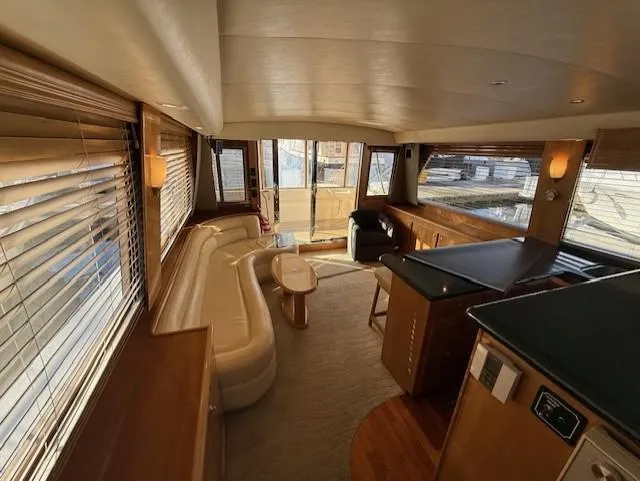 Slide: The Image of Luxurious 2007 Navigator 51 yacht interior with cozy seating and elegant decor. - 2