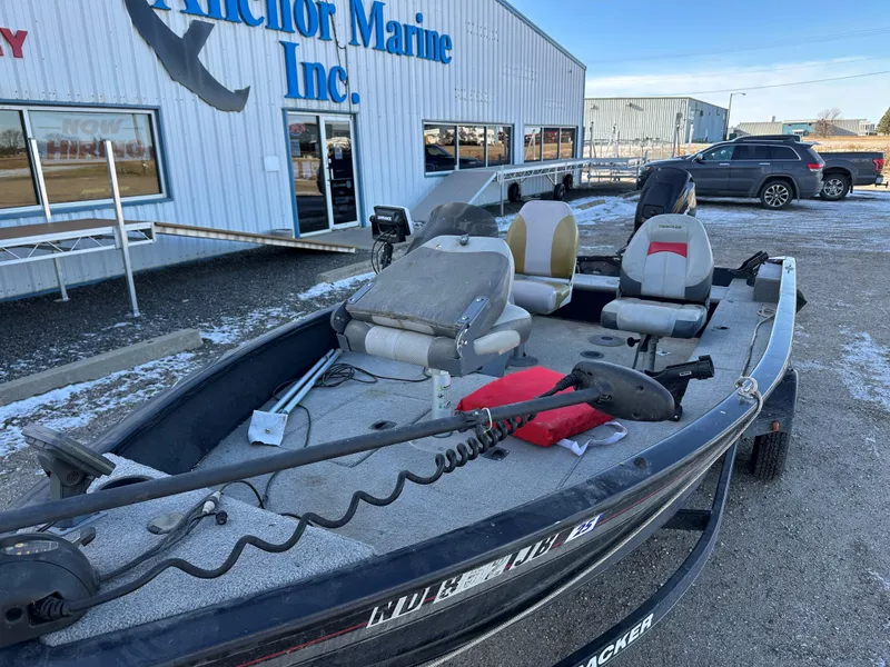 Slide: The Image of 2011 Tracker Super Guide V16 boat at Anchor Marine Inc. dealership. - 6