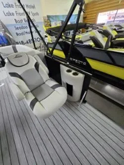 Slide: The Image of 2025 G3 322rc boat interior with plush seating and cup holders. - 8