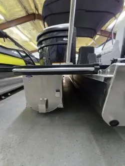 Slide: The Image of 2025 G3 322rc boat in storage, showcasing hull and motor details. - 9