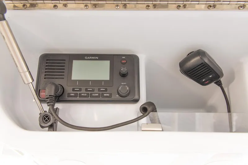 Slide: The Image of Garmin marine radio in 2023 Yellowfin 26 Hybrid boat console. - 18