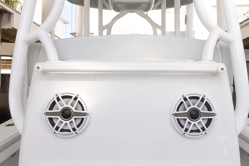 Slide: The Image of 2023 Yellowfin 26 Hybrid boat with dual marine speakers on the console. - 21