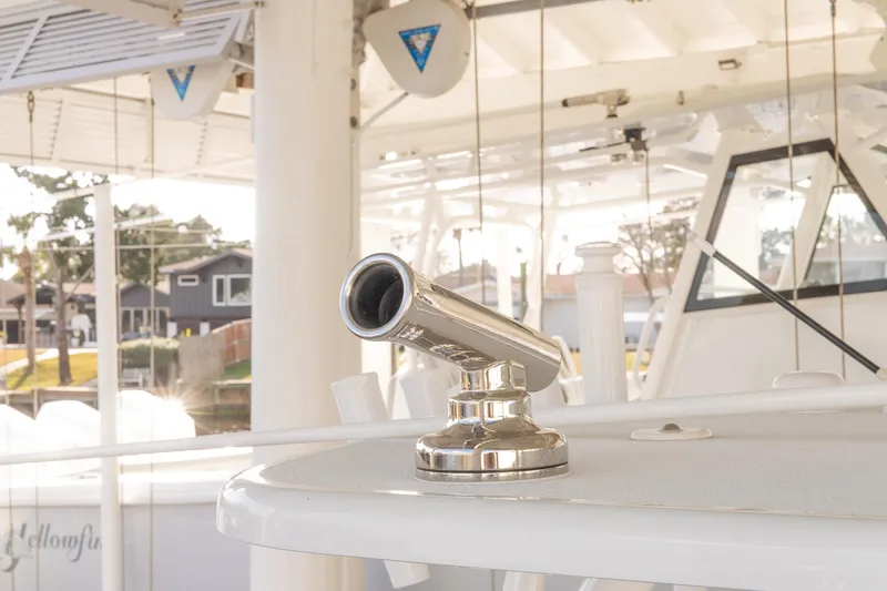 Slide: The Image of 2023 Yellowfin 26 Hybrid boat detail with stainless steel rod holder. - 23