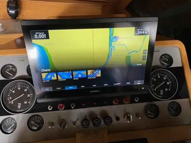 Slide: The Image of Dashboard of a 1989 Ocean Alexander 42 with GPS navigation display. - 20