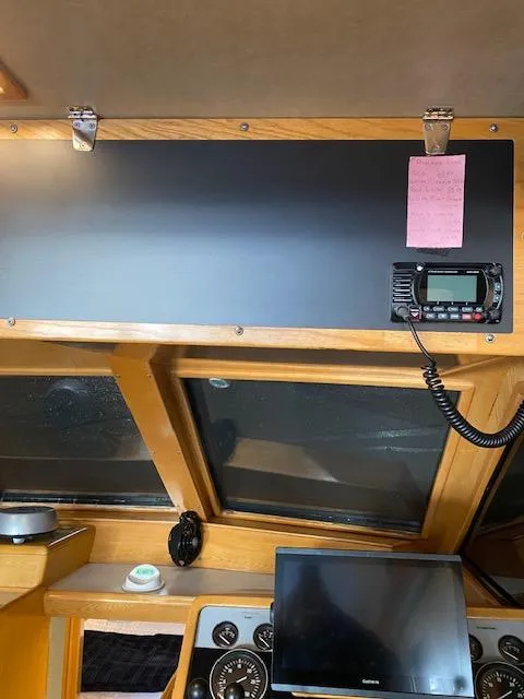 Slide: The Image of Interior of 1989 Ocean Alexander 42 yacht with navigation equipment and dashboard. - 21