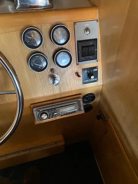 Slide: The Image of Control panel of 1989 Ocean Alexander 42 yacht with gauges and radio. - 23