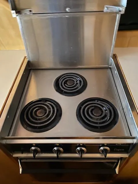 Slide: The Image of Stainless steel three-burner stove on 1989 Ocean Alexander 42 yacht. - 30