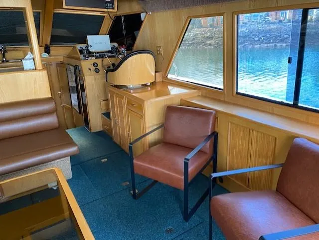 Slide: The Image of Interior of 1989 Ocean Alexander 42 yacht with seating and helm station. - 5