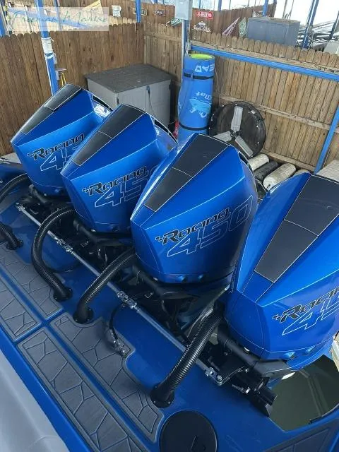 Slide: The Image of Three blue Mercury Racing 450R outboard engines on a 2023 Fountain 43 NX boat. - 4