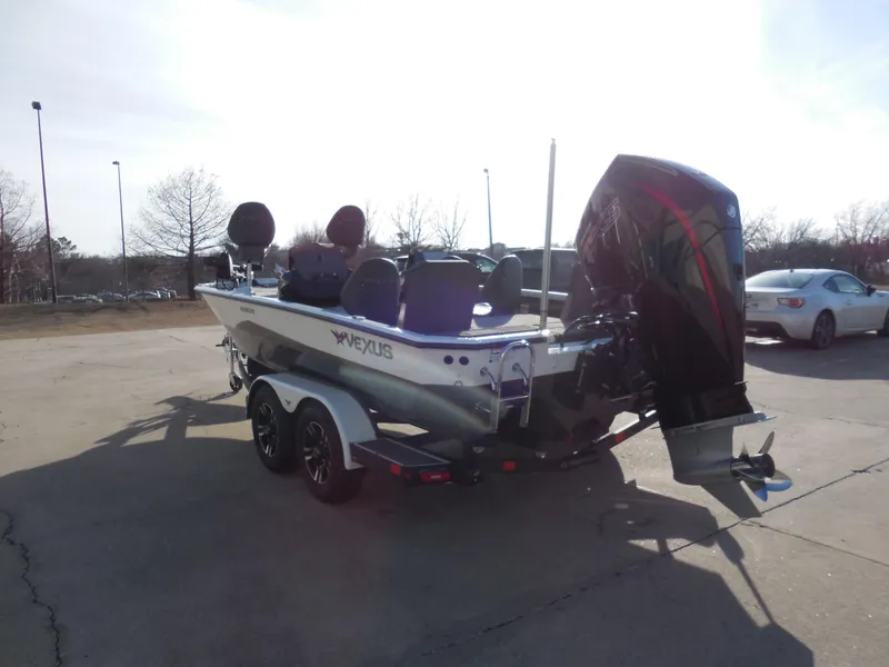 Slide: The Image of 2025 Vexus AVX1985S boat on trailer, parked outdoors, rear view. - 4
