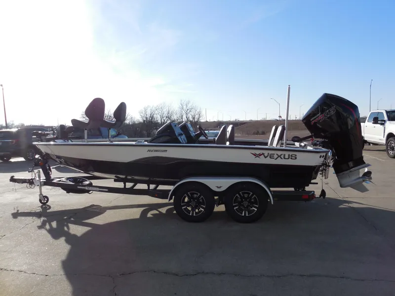 Slide: The Image of 2025 Vexus AVX1985S boat on trailer, side view, outdoors. - 5
