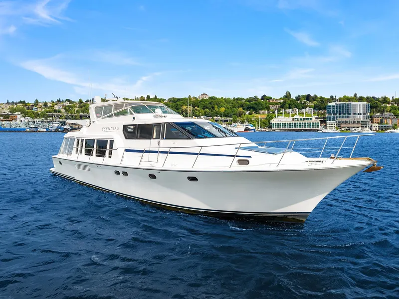 Slide: The Image of 2003 Pacific Mariner Pilothouse yacht cruising on a sunny day. - 1