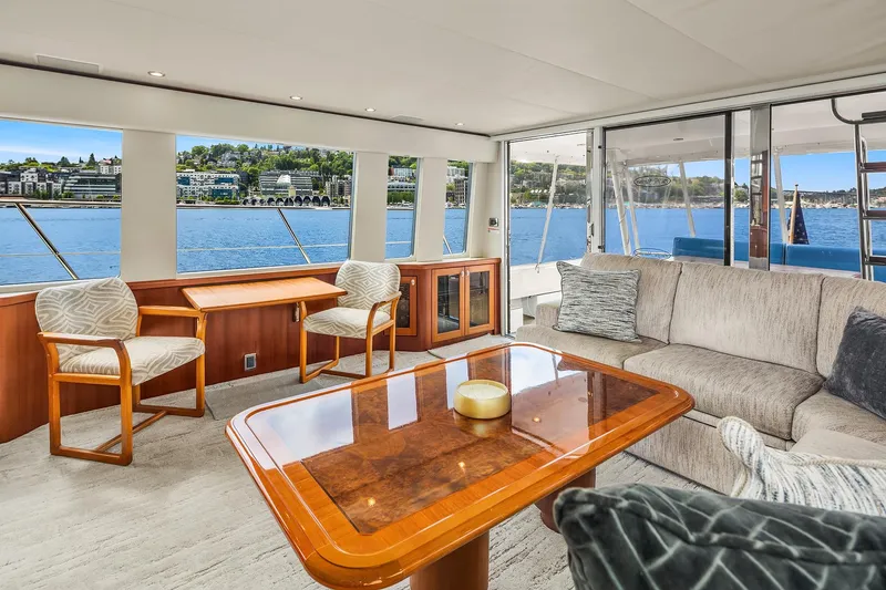 Slide: The Image of Luxurious interior of a 2003 Pacific Mariner Pilothouse yacht with waterfront views. - 10