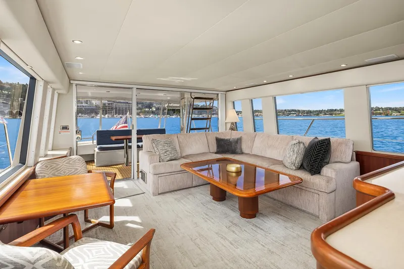 Slide: The Image of Luxurious interior of a 2003 Pacific Mariner Pilothouse yacht with elegant seating and ocean views. - 11