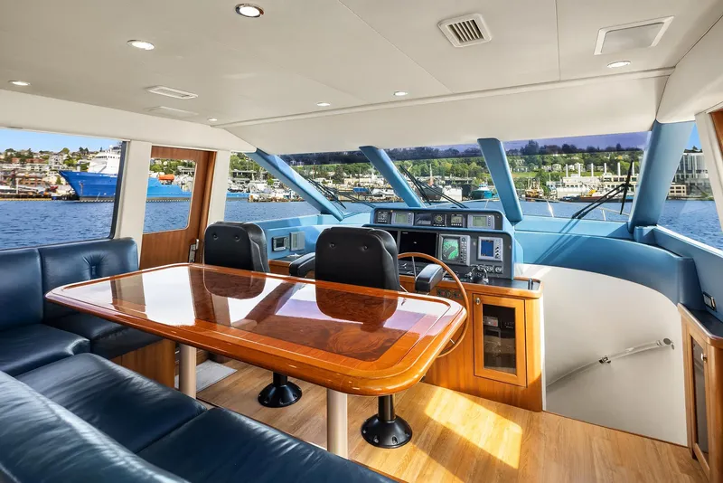 Slide: The Image of Luxurious 2003 Pacific Mariner Pilothouse interior with elegant seating and navigation area. - 15