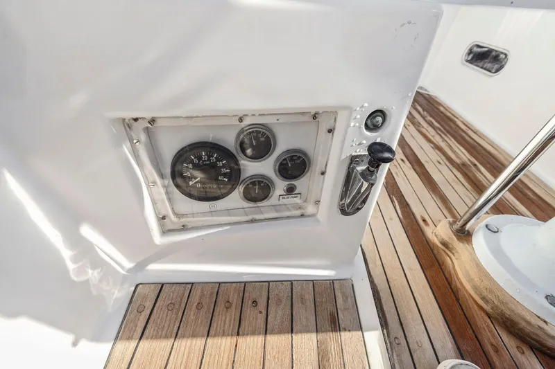 Slide: The Image of Control panel on 1987 Hinckley Sou'wester 42 yacht with wooden deck. - 19