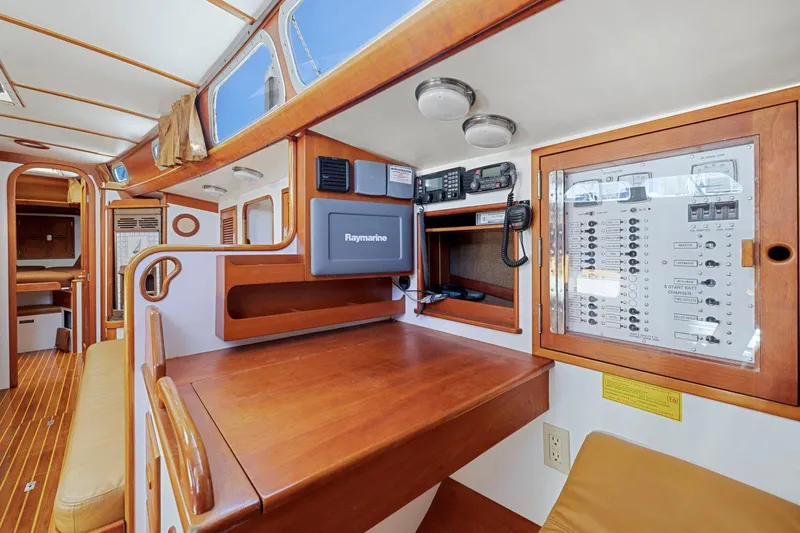 Slide: The Image of Navigation station of 1987 Hinckley Sou'wester 42 yacht with control panel and equipment. - 29