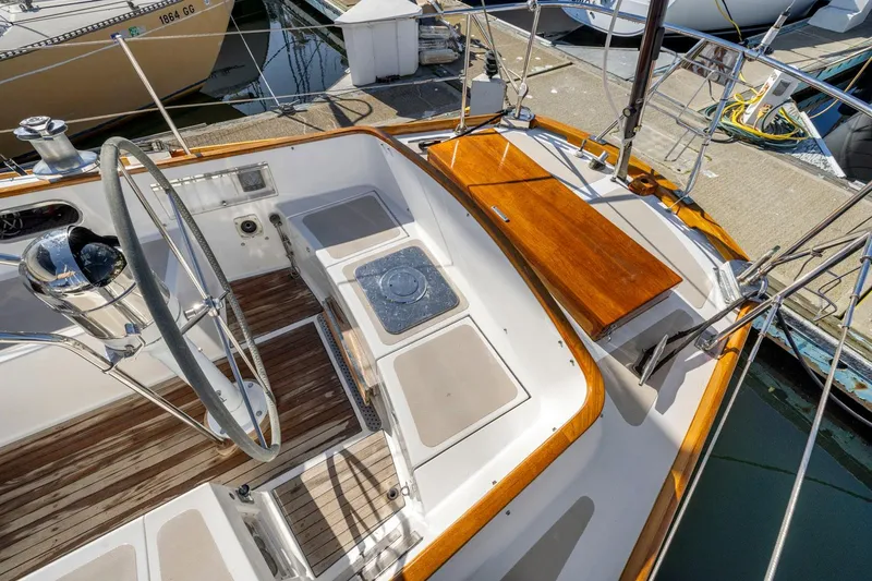 Slide: The Image of Cockpit of 1987 Hinckley Sou'wester 42 sailboat with wooden accents and steering wheel. - 15