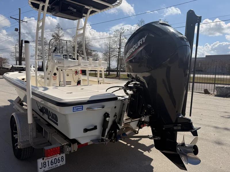 Slide: The Image of 2021 Mako 18 LTS boat with Mercury outboard motor on trailer. - 5