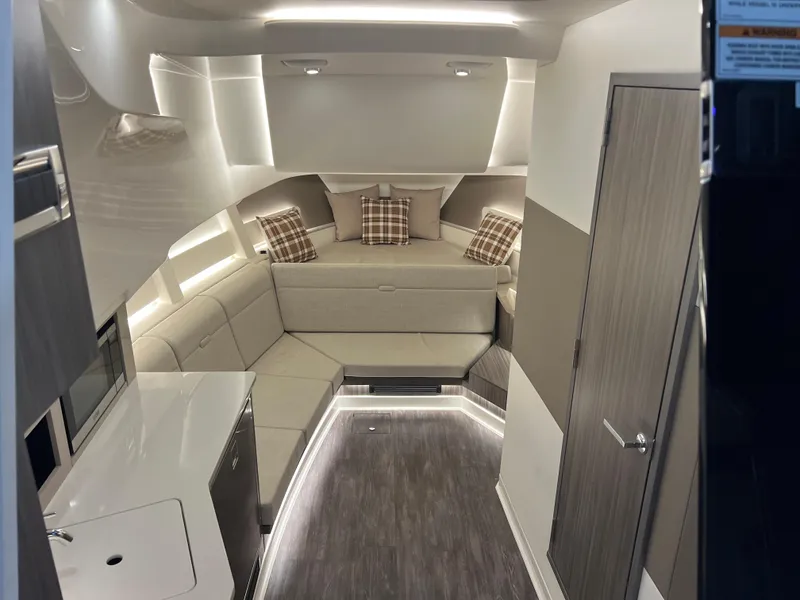 Slide: The Image of Modern kitchen area in 2025 Sea Ray Sundancer 370 OB yacht with sleek design and appliances. - 29