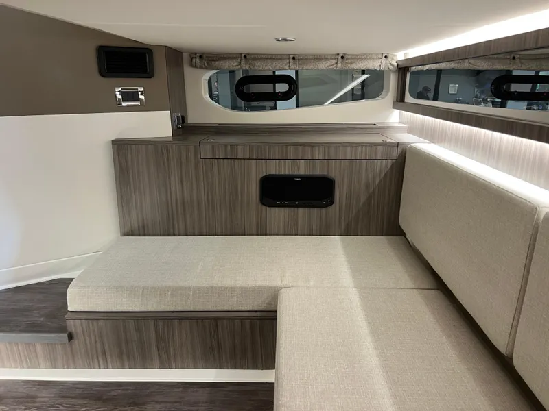 Slide: The Image of 2025 Sea Ray Sundancer 370 OB deck view with sleek design and modern features. - 39