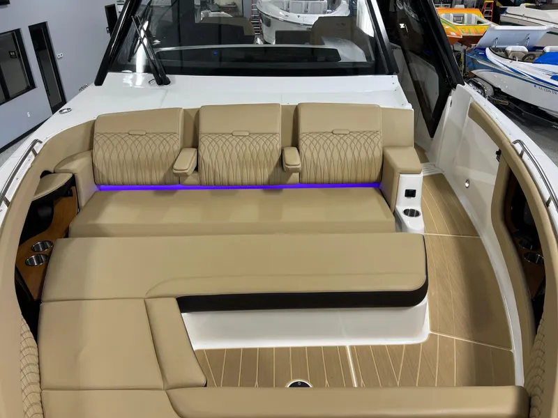 Slide: The Image of 2025 Sea Ray Sundancer 370 OB boat interior view through windshield. - 44