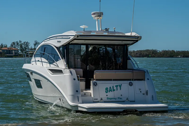 Slide: The Image of 2017 Sea Ray Sundancer 400 yacht cruising on calm waters. - 12