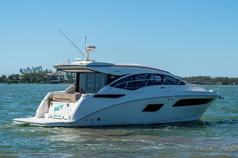 Slide: The Image of 2017 Sea Ray Sundancer 400 yacht cruising on a sunny day. - 18