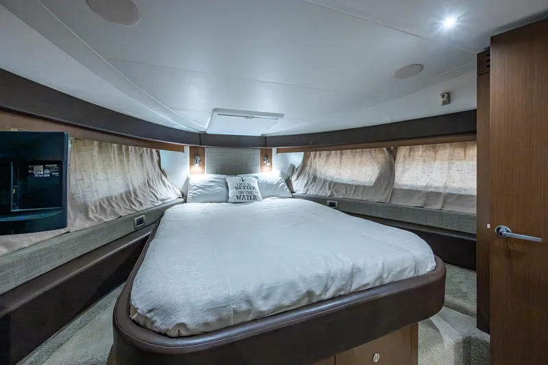 Slide: The Image of Luxurious bedroom interior of 2017 Sea Ray Sundancer 400 yacht with cozy bedding. - 45