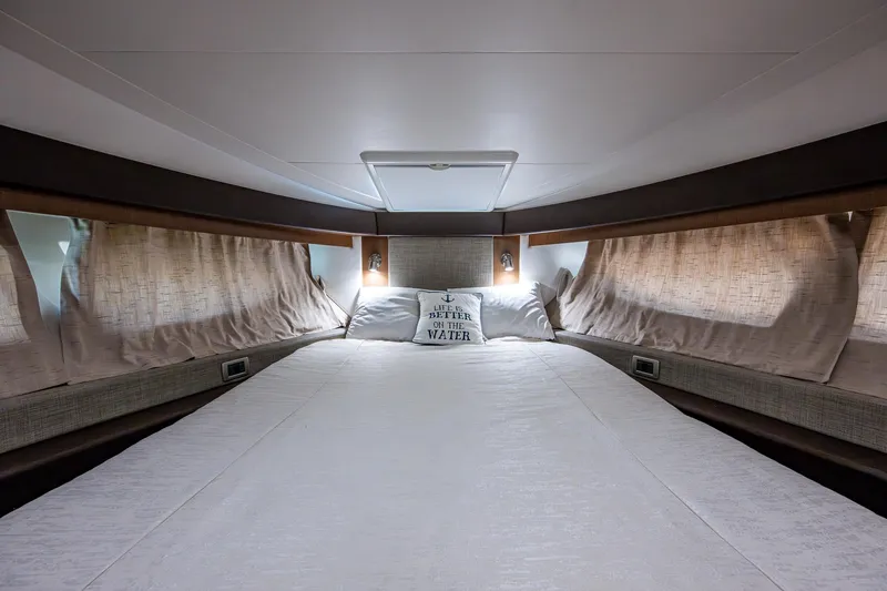 Slide: The Image of Luxurious bedroom interior of 2017 Sea Ray Sundancer 400 yacht with cozy bedding. - 47