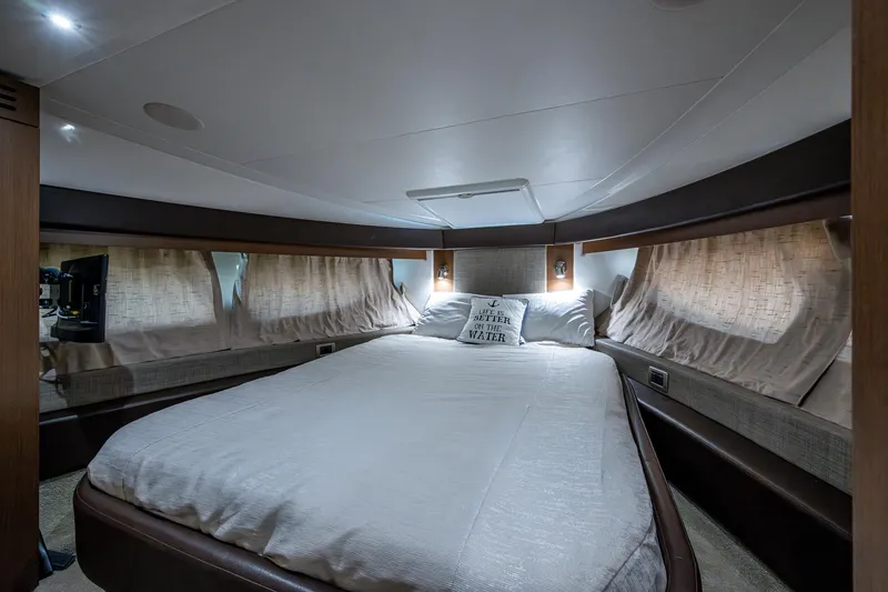 Slide: The Image of Luxurious 2017 Sea Ray Sundancer 400 cabin with cozy bed and elegant lighting. - 48