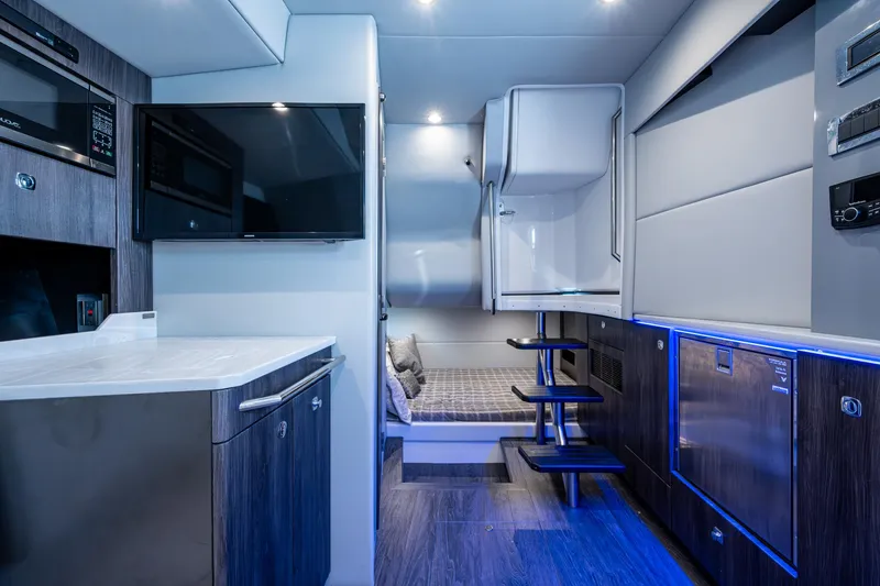 Slide: The Image of Interior of 2021 Formula 380 Super Sport Crossover OB, featuring modern amenities and sleek design. - 10