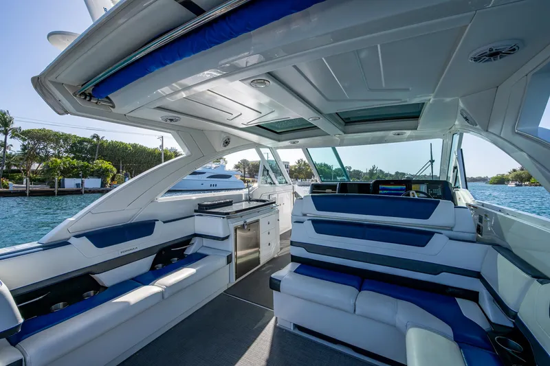 Slide: The Image of 2021 Formula 380 Super Sport Crossover OB interior with luxurious seating and modern design. - 13