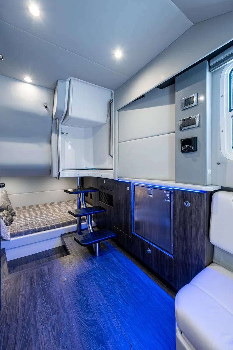 Slide: The Image of Interior of 2021 Formula 380 Super Sport Crossover OB with modern design and ambient lighting. - 14