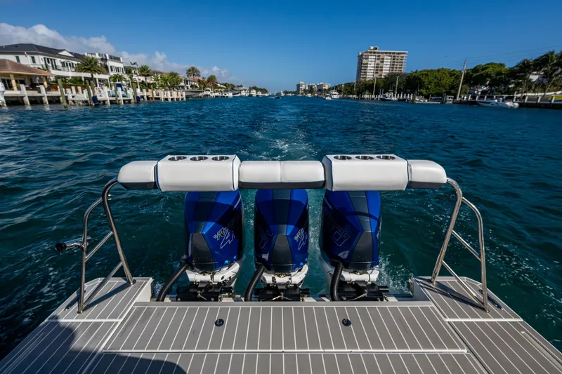Slide: The Image of 2021 Formula 380 Super Sport Crossover OB cruising on a scenic waterway. - 3