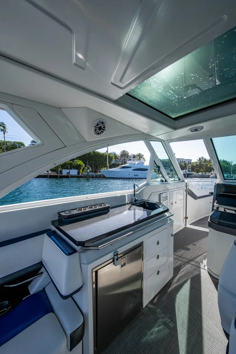 Slide: The Image of 2021 Formula 380 Super Sport Crossover OB interior with sleek design and waterfront view. - 33