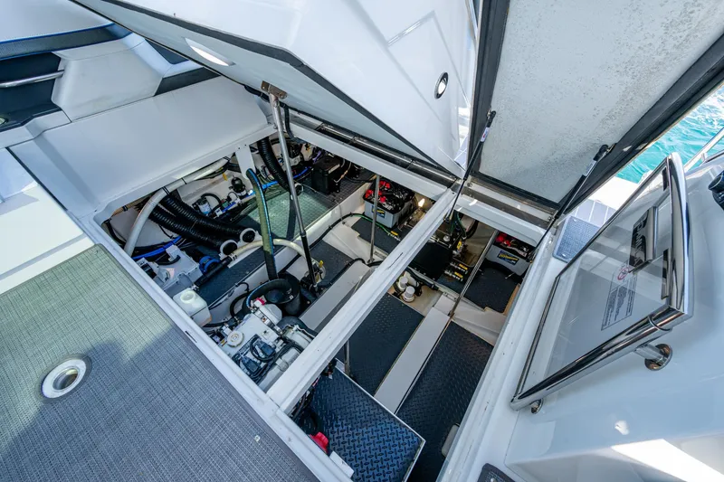 Slide: The Image of Engine compartment of 2021 Formula 380 Super Sport Crossover OB, showcasing mechanical components. - 39