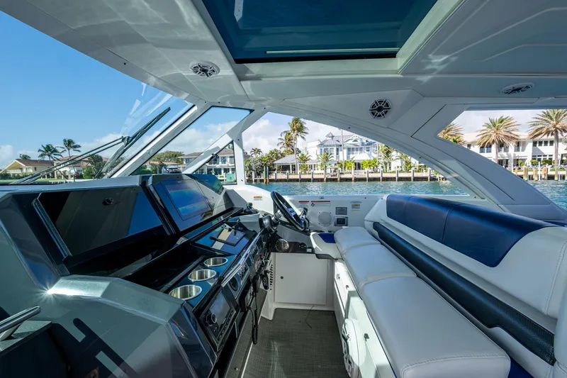 Slide: The Image of 2021 Formula 380 Super Sport Crossover OB interior with luxurious seating and modern dashboard. - 41