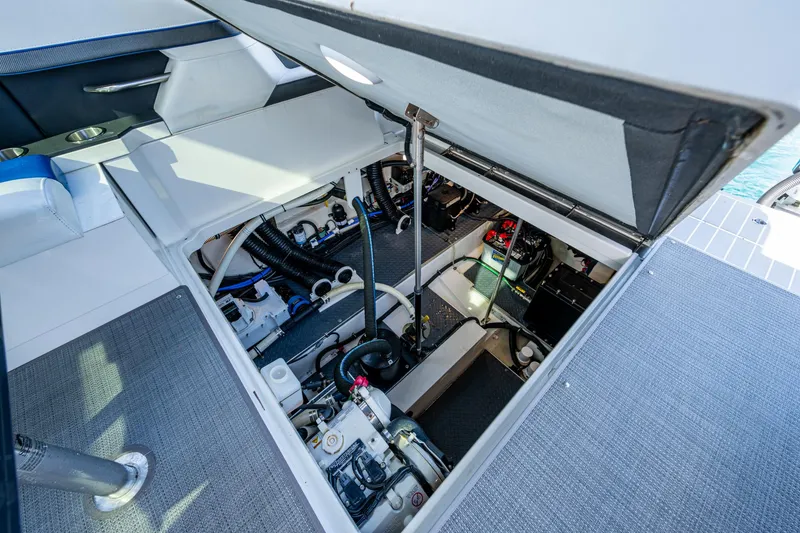 Slide: The Image of 2021 Formula 380 Super Sport Crossover OB engine compartment, showcasing mechanical components and storage. - 42