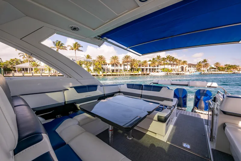 Slide: The Image of 2021 Formula 380 Super Sport Crossover OB interior with luxurious seating and ocean view. - 43