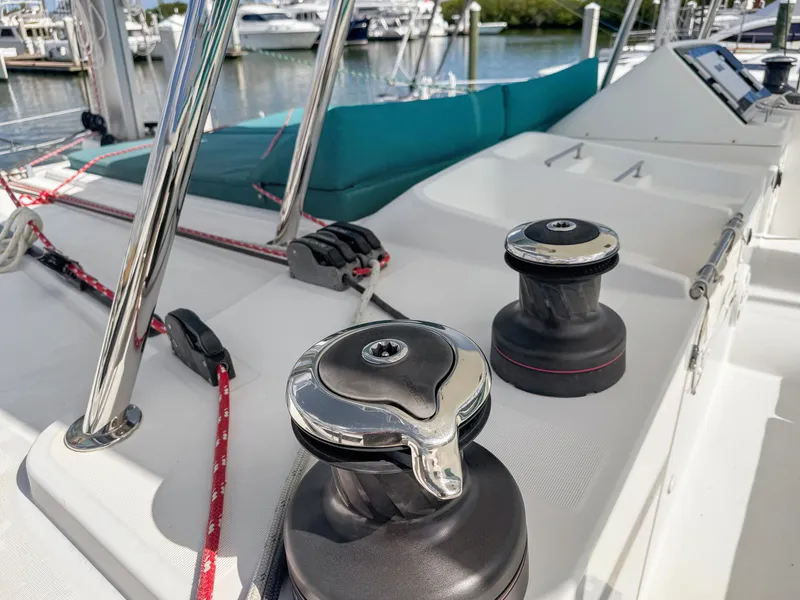Slide: The Image of Deck of 2017 Lagoon 450 F catamaran with winches and ropes, docked at marina. - 19