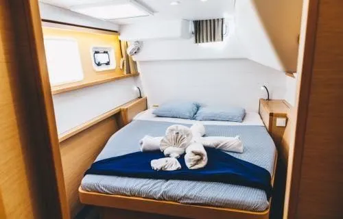 Slide: The Image of Luxurious cabin interior of 2017 Lagoon 450 F yacht with neatly arranged bed. - 36