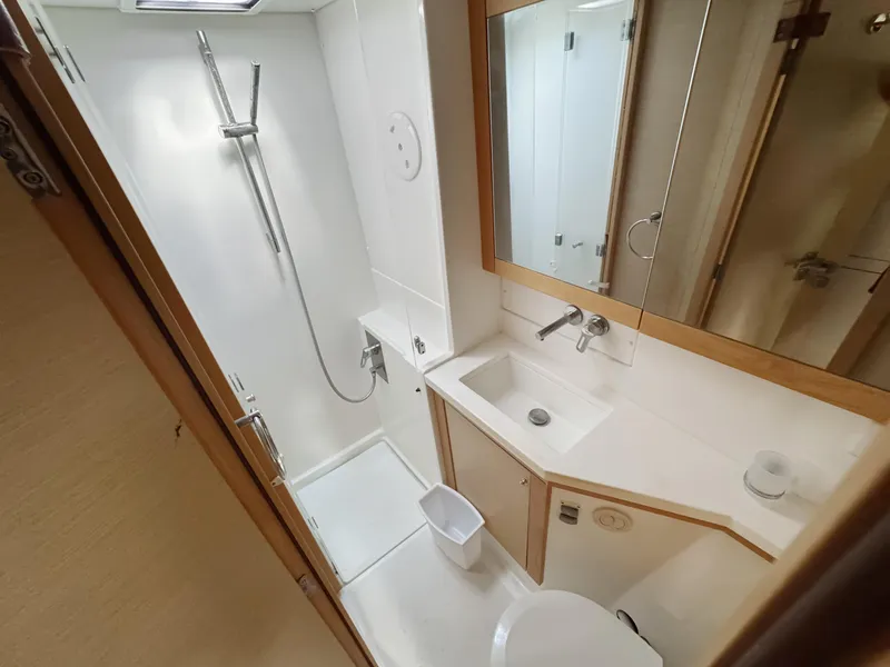 Slide: The Image of Bathroom interior of 2017 Lagoon 450 F yacht, featuring shower and sink. - 38