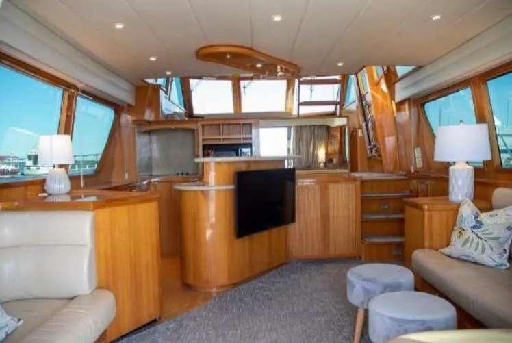 Slide: The Image of Luxurious interior of 2005 McKinna 57 Pilothouse yacht with modern furnishings and large windows. - 10