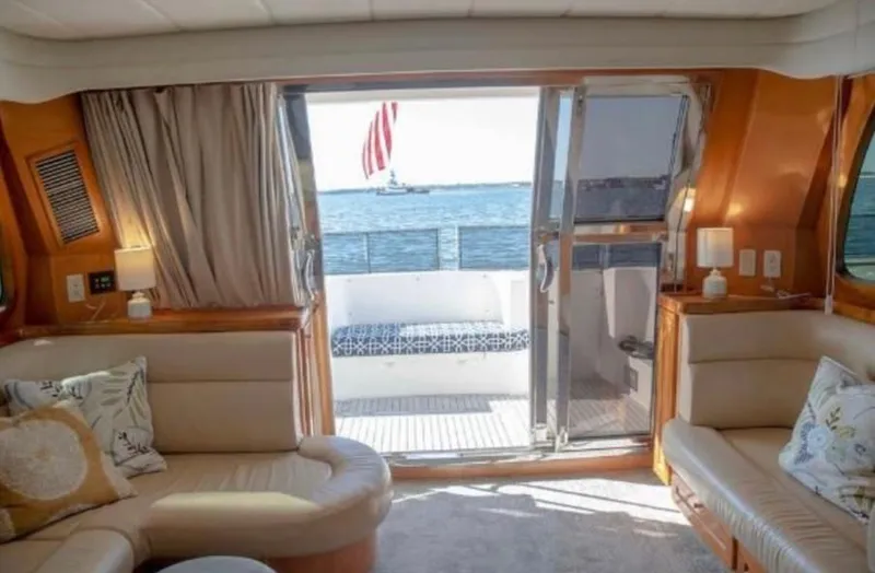 Slide: The Image of Luxurious interior of 2005 McKinna 57 Pilothouse yacht with ocean view. - 4