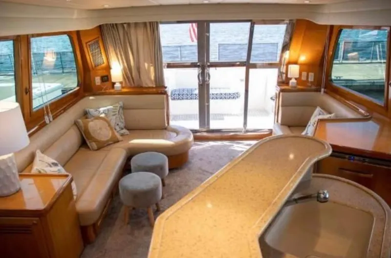 Slide: The Image of Luxurious interior of 2005 McKinna 57 Pilothouse yacht with elegant seating and modern design. - 5