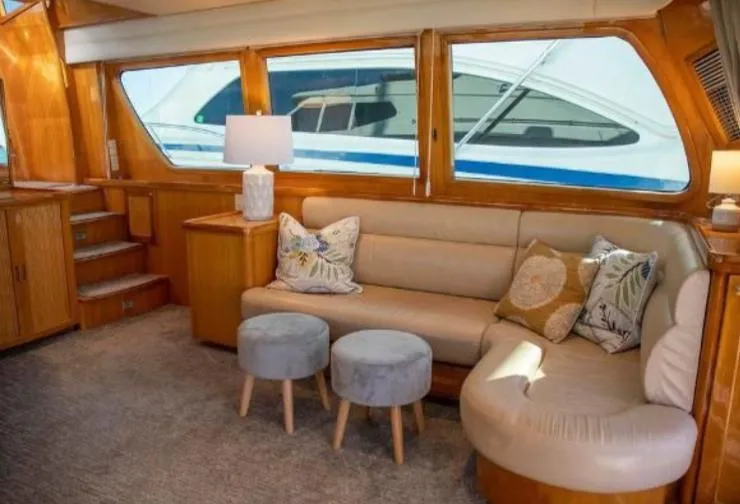 Slide: The Image of Interior of 2005 McKinna 57 Pilothouse yacht with cozy seating and elegant decor. - 9