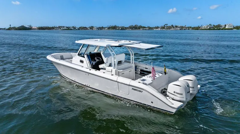 The Image of 2021 Pursuit S 328 Sport boat on open water, featuring twin Yamaha engines. - 0