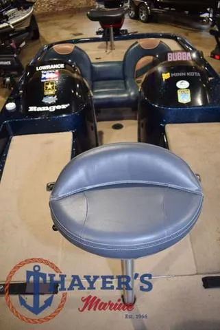 Slide: The Image of Ranger R83 boat interior with seating, featuring Thayer's Marine logo, 2000 model. - 17